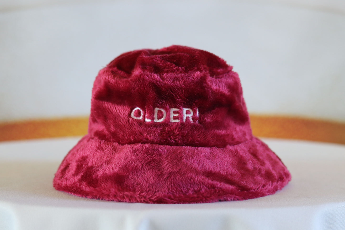 Caxton "QLDER!" Fluffy Bucket Hat in Maroon